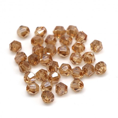 Бусины биконус 2мм, шампань